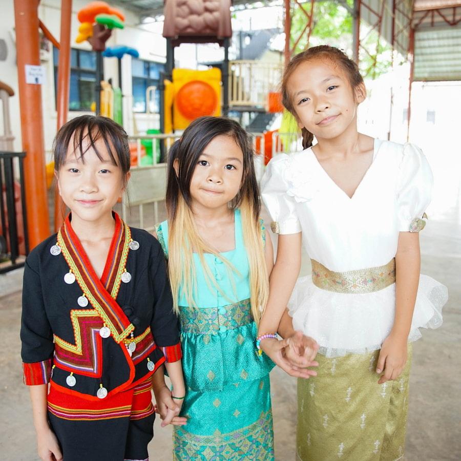 Three students posing in spirit wear