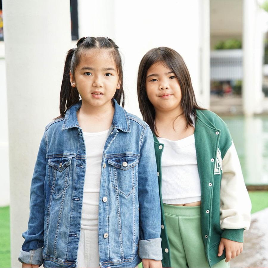 Two students posing in spirit wear