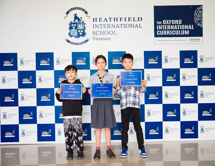 Children holding awards